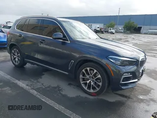 2021 BMW X5 xDrive45e with VIN 5UXTA6C09M9D26035, listed as a IAAI auction lot 41788981 with 60,571 mi miles. Bid and sale history available at carsss.com. Image 1.