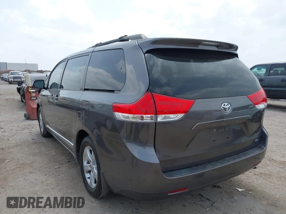 2013 Toyota Sienna LE AAS with VIN 5TDKK3DC1DS392577, listed as a IAAI auction lot 41932168 with 90,643 mi miles and . Bid and sale history available at DreamBid. Image 3.