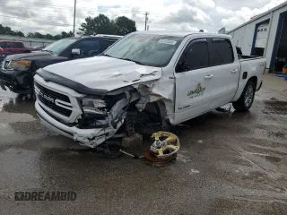 2020 Ram 1500 Lone Star with VIN 1C6RREFT5LN158148, listed as a Copart auction lot 63464644 with 75,526 mi miles and Salvage title. Bid and sale history available at DreamBid. Image 1.
