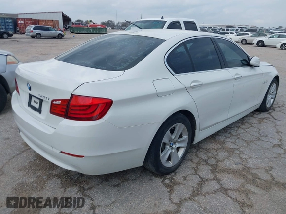 2013 BMW 5 Series 528i with VIN WBAXG5C55DDY33772, listed as a IAAI auction lot 41605701 with 131,473 mi miles and . Bid and sale history available at carsss.com. Image 4.