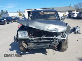 1999 Toyota Land Cruiser with VIN JT3HT05J5X0045784, listed as a IAAI auction lot 41886919 with 505,121 mi miles. Bid and sale history available at carsss.com. Image 13.