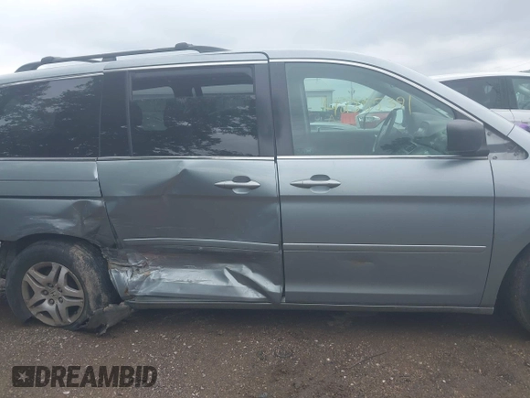 2007 Honda Odyssey EX z VIN 5FNRL38407B084436, wystawiony jako IAAI lot #42355391 z przebiegiem 144 607 mil mil oraz . Historia ofert i sprzedaży dostępna na DreamBid. Obrazek 14.