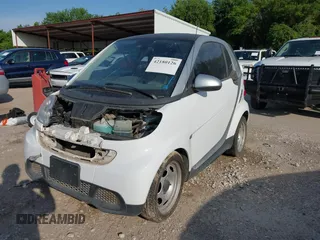 2015 Smart fortwo Passion with VIN WMEEJ3BA4FK800163, listed as a IAAI auction lot 42180126 with 53,138 mi miles. Bid and sale history available at carsss.com. Image 2.