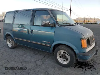 1986 GMC Safari z VIN 1GDDM15Z1GB521872, wystawiony jako Copart lot #87655995 z przebiegiem 30 889 mil mil oraz Szkody całkowita. Historia ofert i sprzedaży dostępna na DreamBid. Obrazek 4.