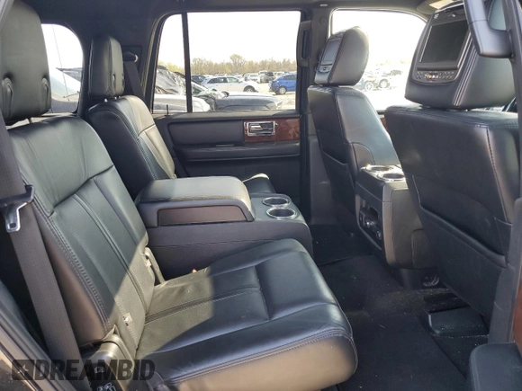 2015 Lincoln Navigator z VIN 5LMJJ2JT7FEJ04172, wystawiony jako Copart lot #51412255 z przebiegiem 220 416 mil mil oraz Szkoda całkowita • Salvage title. Historia ofert i sprzedaży dostępna na DreamBid. Obrazek 11.