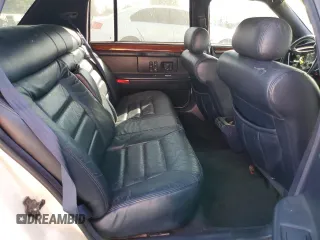 1995 Cadillac Concours z VIN 1G6KF52Y0SU301356, wystawiony jako Copart lot #77372694 z przebiegiem 132 934 mil mil oraz Szkody całkowita. Historia ofert i sprzedaży dostępna na DreamBid. Obrazek 10.