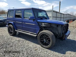 2014 Mercedes-Benz G with VIN WDCYC3HF1EX215559, listed as a Copart auction lot 51412685 with 68,165 mi miles and Salvage Title. Bid and sale history available at carsss.com. Image 4.