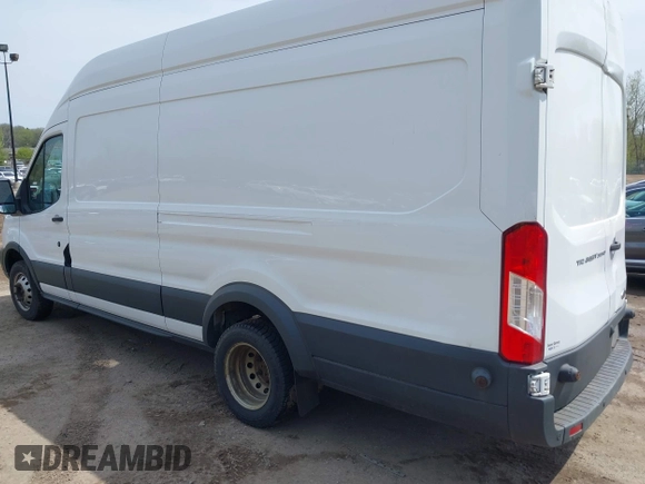 2017 Ford Transit z VIN 1FTBF4XM0HKA58004, wystawiony jako IAAI lot #39278218 z przebiegiem 174 620 mil mil oraz . Historia ofert i sprzedaży dostępna na DreamBid. Obrazek 3.