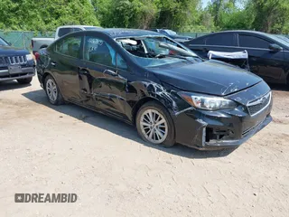 2017 Subaru Impreza Premium z VIN 4S3GKAB68H3606060, wystawiony jako IAAI lot #42167905 z przebiegiem 77 802 mil mil oraz . Historia ofert i sprzedaży dostępna na DreamBid. Obrazek 1.