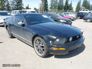 2005 Ford Mustang Deluxe with VIN 1ZVFT80N255136908, listed as a IAAI auction lot 41961425 with 157,110 mi miles. Bid and sale history available at carsss.com. Image 1.