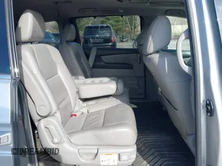 2012 Honda Odyssey Touring with VIN 5FNRL5H95CB063003, listed as a IAAI auction lot 41871975 with 179,332 mi miles and . Bid and sale history available at DreamBid. Image 8.
