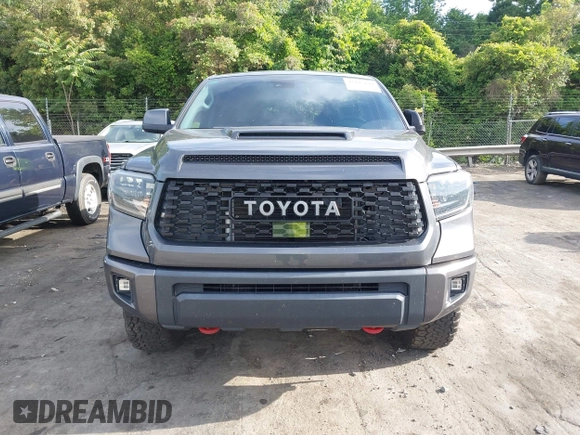 2021 Toyota Tundra SR5 with VIN 5TFDY5F19MX004939, listed as a IAAI auction lot 42197440 with 94,299 mi miles and . Bid and sale history available at DreamBid. Image 12.