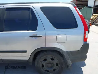 2005 Honda CR-V LX with VIN JHLRD685X5C011434, listed as a IAAI auction lot 42018369 with 234,993 mi miles and . Bid and sale history available at DreamBid. Image 14.