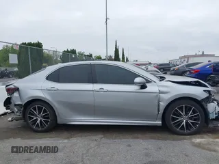 2023 Toyota Camry SE with VIN 4T1G11AKXPU809876, listed as a IAAI auction lot 42100546 with 35,055 mi miles and . Bid and sale history available at DreamBid. Image 13.