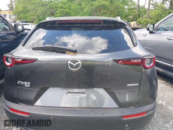 2023 Mazda CX-30 S Premium with VIN 3MVDMBDM2PM526974, listed as a IAAI auction lot 42155416 with 22,428 mi miles and . Bid and sale history available at carsss.com. Image 16.