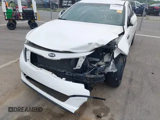 2014 Kia Optima LX with VIN KNAGM4A7XE5481131, listed as a IAAI auction lot 42494495 with 97,223 mi miles and . Bid and sale history available at DreamBid. Image 6.