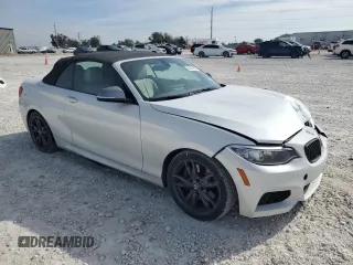2016 BMW 2 Series M235i with VIN WBA1M1C52GV394052, listed as a Copart auction lot 82261594 with 83,979 mi miles and Salvage Title. Bid and sale history available at carsss.com. Image 4.