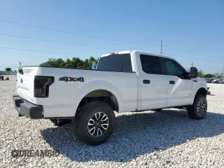 2015 Ford F-150 XLT w/HD Payload Pkg with VIN 1FTFW1EG6FFA02457, listed as a Copart auction lot 52121515 with 242,747 mi miles and Salvage Title. Bid and sale history available at carsss.com. Image 3.