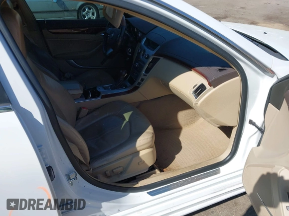2011 Cadillac CTS Luxury with VIN 1G6DE5EY5B0119957, listed as a IAAI auction lot 41642172 with 228,401 mi miles and . Bid and sale history available at DreamBid. Image 5.