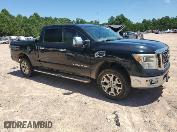 2016 Nissan Titan Platinum Reserve with VIN 1N6BA1F48GN513710, listed as a Copart auction lot 61187715 with 291,548 mi miles and Clean title. Bid and sale history available at DreamBid. Image 4.