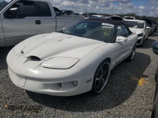 2001 Pontiac Firebird Firebird z VIN 2G2FS32K912126317, wystawiony jako Copart lot #74510454 z przebiegiem Nie podano mil oraz Szkody całkowita. Historia ofert i sprzedaży dostępna na DreamBid. Obrazek 1.