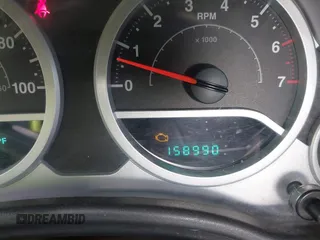 2007 Jeep Wrangler Unlimited Sahara with VIN 1J4GA59177L182593, listed as a IAAI auction lot 42104934 with 158,990 mi miles and . Bid and sale history available at DreamBid. Image 15.