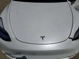2023 Tesla Model Y Long Range z VIN 7SAYGDEE2PA061792, wystawiony jako Copart lot #52106965 z przebiegiem 11 968 mil mil oraz Szkoda całkowita • Salvage title. Historia ofert i sprzedaży dostępna na DreamBid. Obrazek 11.