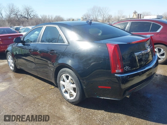 2009 Cadillac CTS AWD z VIN 1G6DH577290166448, wystawiony jako IAAI lot #41751610 z przebiegiem 158 378 mil mil oraz . Historia ofert i sprzedaży dostępna na DreamBid. Obrazek 3.