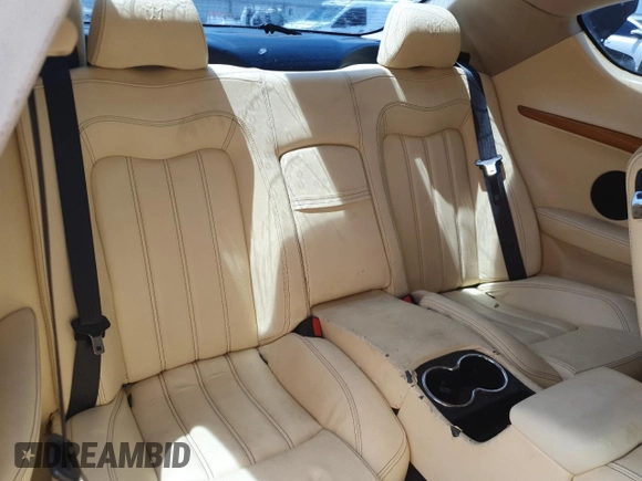 2008 Maserati GranTurismo z VIN ZAMGJ45A180038235, wystawiony jako Copart lot #63444435 z przebiegiem 27 mil mil oraz Czysty tytuł • Clean title. Historia ofert i sprzedaży dostępna na DreamBid. Obrazek 10.