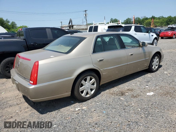 2006 Cadillac DTS 1SC z VIN 1G6KD57Y26U175599, wystawiony jako Copart lot #59149155 z przebiegiem 172 952 mil mil oraz Czysty tytuł • Clean title. Historia ofert i sprzedaży dostępna na DreamBid. Obrazek 3.