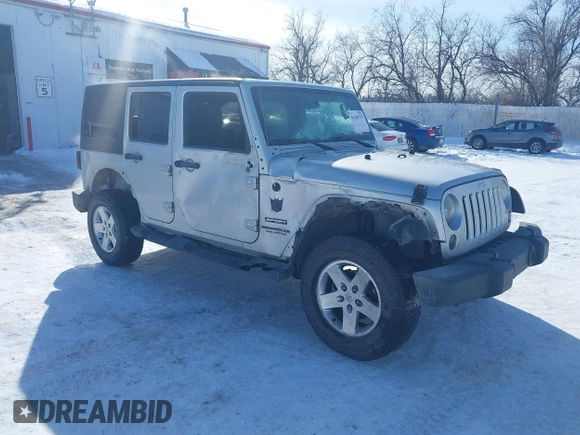 2012 Jeep Wrangler Unlimited Sport z VIN 1C4HJWDG3CL224800, wystawiony jako IAAI lot #41569279 z przebiegiem 174 336 mil mil oraz . Historia ofert i sprzedaży dostępna na DreamBid. Obrazek 1.