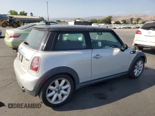 2013 MINI Hardtop with VIN WMWSU3C58DT371379, listed as a Copart auction lot 59606005 with 59,901 mi miles and Salvage title. Bid and sale history available at DreamBid. Image 3.