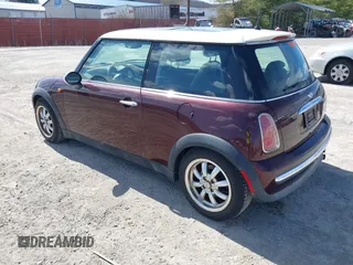 2003 MINI Hardtop with VIN WMWRC33473TC47288, listed as a IAAI auction lot 41881197 with 115,859 mi miles and . Bid and sale history available at DreamBid. Image 3.