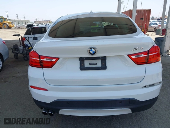 2015 BMW X4 xDrive28i with VIN 5UXXW3C5XF0M89259, listed as a IAAI auction lot 42553903 with 98,960 mi miles and . Bid and sale history available at DreamBid. Image 16.