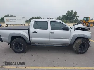 2006 Toyota Tacoma PreRunner z VIN 3TMJU62NX6M018693, wystawiony jako IAAI lot #42184797 z przebiegiem 193 953 mil mil oraz . Historia ofert i sprzedaży dostępna na DreamBid. Obrazek 14.