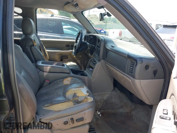 2004 Chevrolet Tahoe LS with VIN 1GNEC13T04R156427, listed as a IAAI auction lot 42333312 with 303,040 mi miles and . Bid and sale history available at DreamBid. Image 5.