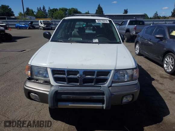 1999 Subaru Forester S with VIN JF1SF6557XH703160, listed as a Copart auction lot 60076974 with 0 mi miles and Salvage Title. Bid and sale history available at carsss.com. Image 5.
