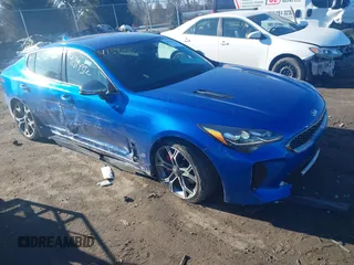 2019 Kia Stinger GT with VIN KNAE35LC3K6061517, listed as a IAAI auction lot 41394312 with 57,318 mi miles. Bid and sale history available at carsss.com. Image 1.