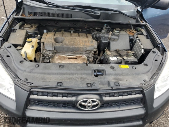 2012 Toyota RAV4 z VIN 2T3BF4DV7CW230817, wystawiony jako Copart lot #63227405 z przebiegiem 231 028 mil mil oraz Szkoda całkowita • Salvage title. Historia ofert i sprzedaży dostępna na DreamBid. Obrazek 11.