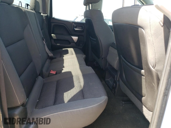 2015 Chevrolet Silverado 1500 LT with VIN 1GCVKREC7FZ435447, listed as a Copart auction lot 54519515 with 124,881 mi miles and Salvage Title. Bid and sale history available at DreamBid. Image 10.