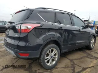 2017 Ford Escape SE z VIN 1FMCU0GD7HUD27649, wystawiony jako Copart lot #57398685 z przebiegiem 117 485 mil mil oraz Czysty tytuł • Clean title. Historia ofert i sprzedaży dostępna na DreamBid. Obrazek 3.