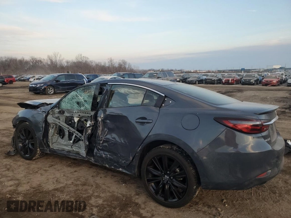 2021 Mazda 6 Carbon Edition with VIN JM1GL1WY6M1608632, listed as a Copart auction lot 88045655 with 48,749 mi miles and Salvage Title. Bid and sale history available at DreamBid. Image 2.