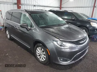 2018 Chrysler Pacifica Touring L with VIN 2C4RC1BG1JR322717, listed as a IAAI auction lot 42407752 with 96,608 mi miles and . Bid and sale history available at DreamBid. Image 1.