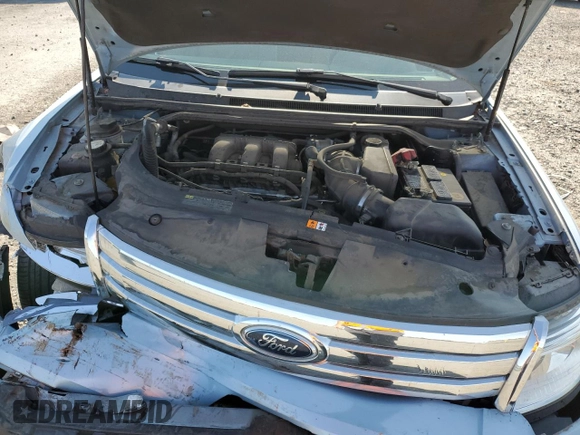 2008 Ford Taurus SEL z VIN 1FAHP24W38G148905, wystawiony jako Copart lot #59186355 z przebiegiem 108 185 mil mil oraz Szkoda całkowita • Salvage title. Historia ofert i sprzedaży dostępna na DreamBid. Obrazek 11.