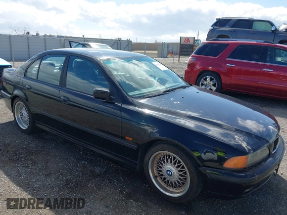 2000 BMW 5 Series 528iA with VIN WBADM6344YGU10257, listed as a IAAI auction lot 41773733 with 231,028 mi miles. Bid and sale history available at carsss.com. Image 1.