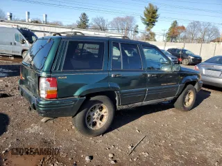 1997 Jeep Grand Cherokee Limited with VIN 1J4GZ78Y2VC728605, listed as a Copart auction lot 83342804 with 104,185 mi miles and Salvage Title. Bid and sale history available at carsss.com. Image 3.