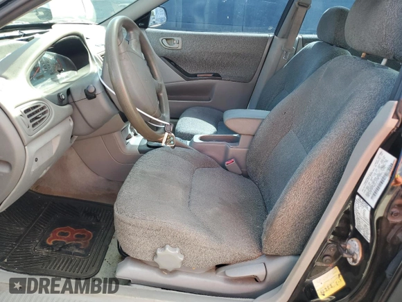 2002 Mitsubishi Galant with VIN 4A3AA36G12E165484, listed as a Copart auction lot 77563634 with 189,776 mi miles and Salvage Title. Bid and sale history available at DreamBid. Image 7.