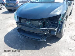 2017 Nissan Rogue SV with VIN KNMAT2MV7HP593405, listed as a IAAI auction lot 42026064 with 184,161 mi miles. Bid and sale history available at carsss.com. Image 6.