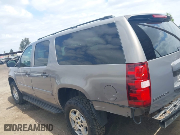 2007 Chevrolet Suburban LT z VIN 1GNFK163X7J289542, wystawiony jako IAAI lot #42054920 z przebiegiem 146 702 mil mil oraz . Historia ofert i sprzedaży dostępna na DreamBid. Obrazek 15.