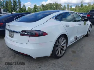 2016 Tesla Model S 90D with VIN 5YJSA1E22GF155747, listed as a IAAI auction lot 42630085 with 97,896 mi miles and . Bid and sale history available at DreamBid. Image 4.